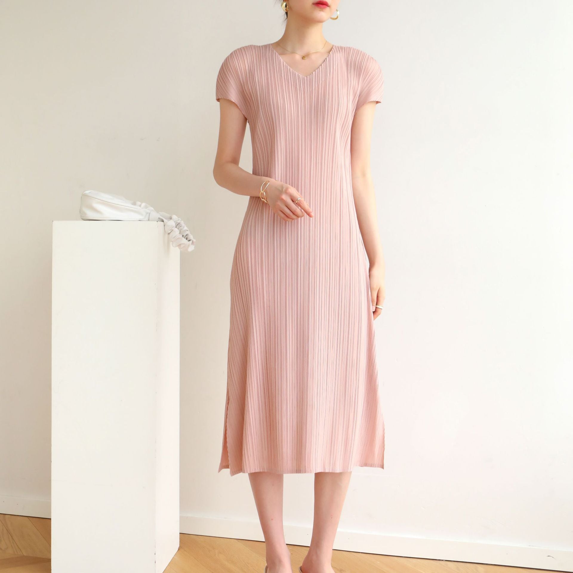 Elegant Fashion V-Neck Dress with Pleated Design Simple and Stylish, High-Quality Material