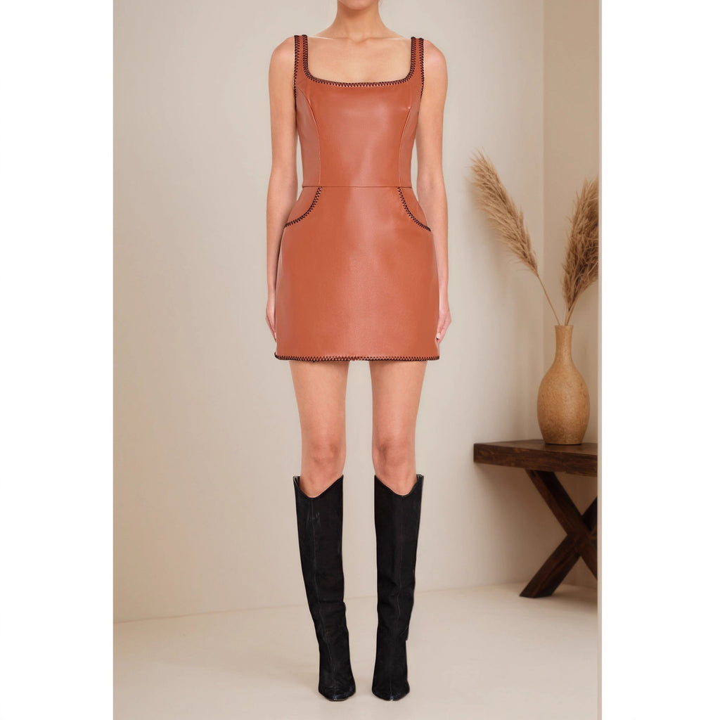 Tight fitting hip hugging sleeveless dress