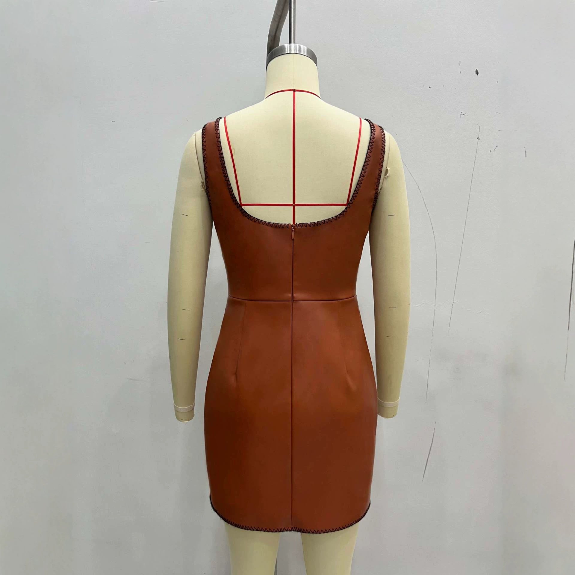 Tight fitting hip hugging sleeveless dress