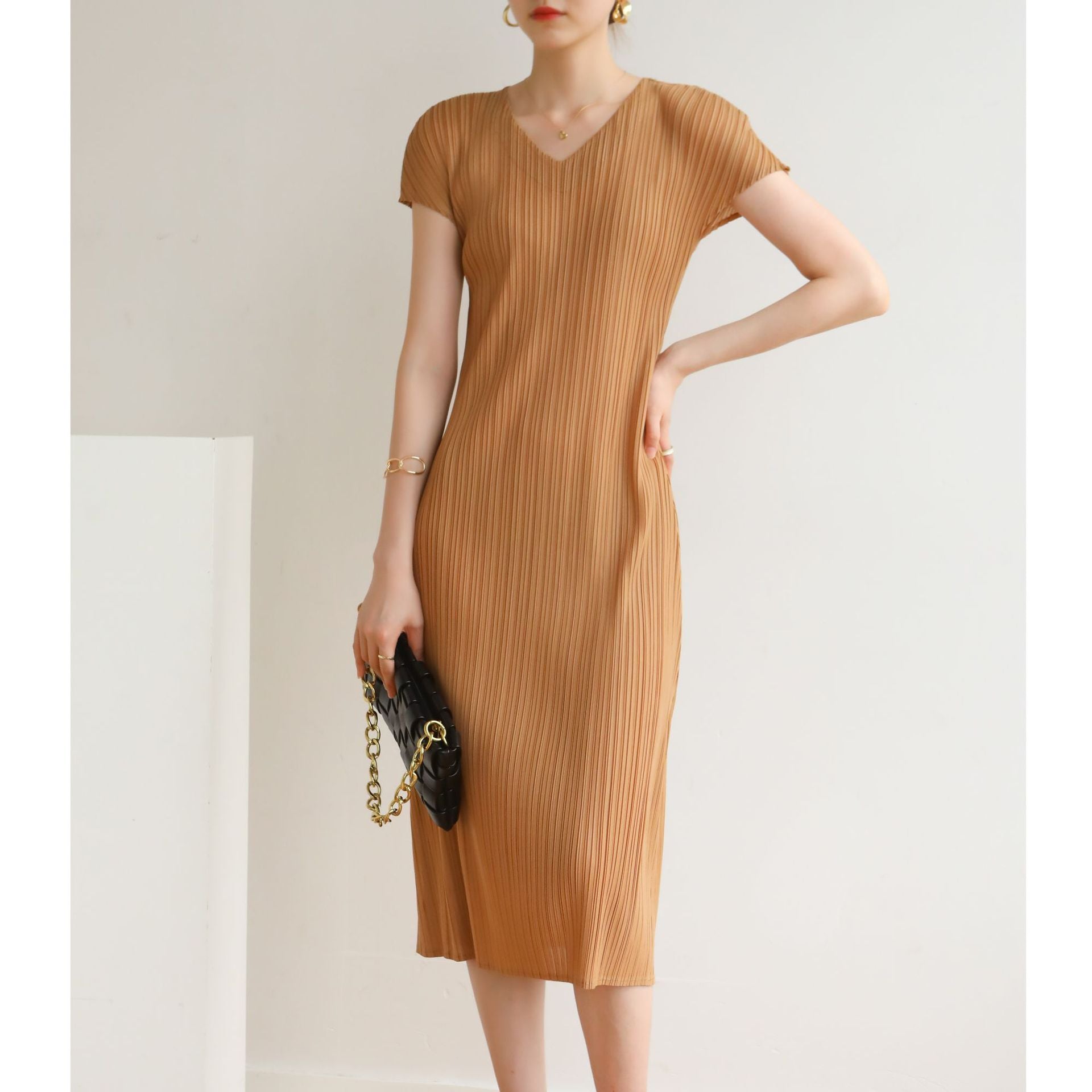 Elegant Fashion V-Neck Dress with Pleated Design Simple and Stylish, High-Quality Material