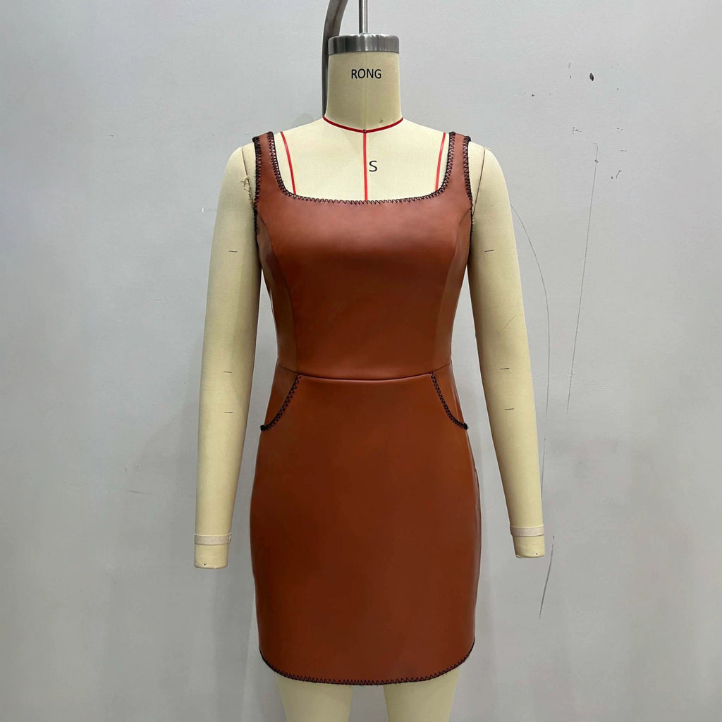 Tight fitting hip hugging sleeveless dress