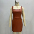 Tight fitting hip hugging sleeveless dress